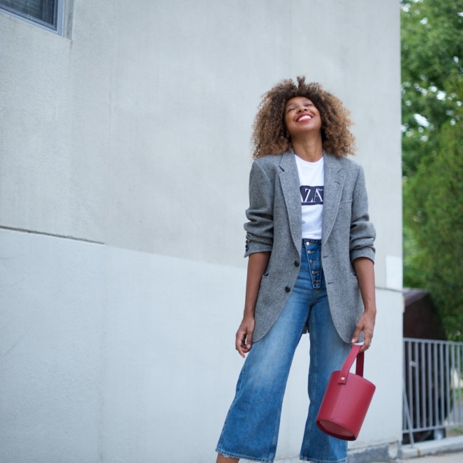 Karen Blanchard wearing zara wide leg jeans and a grey checked blazer